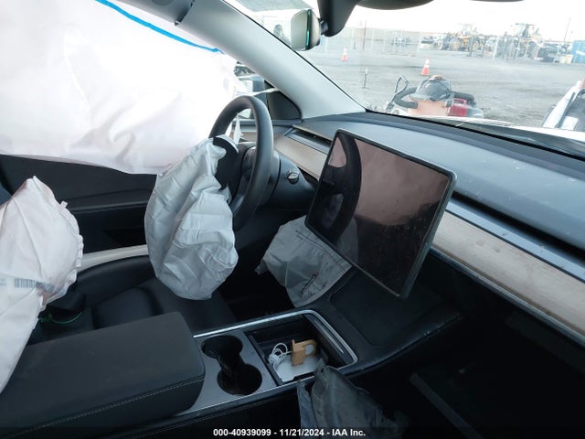 2023 TESLA MODEL Y 7SAYGAEE0PF907791 Photo 4