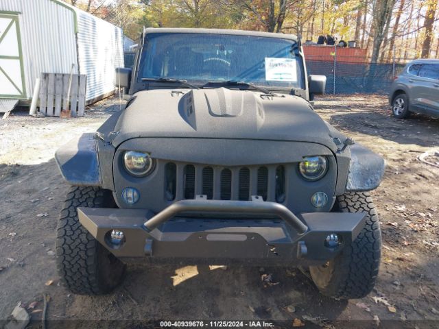 1C4AJWAG9EL233347 Jeep Wrangler Sport