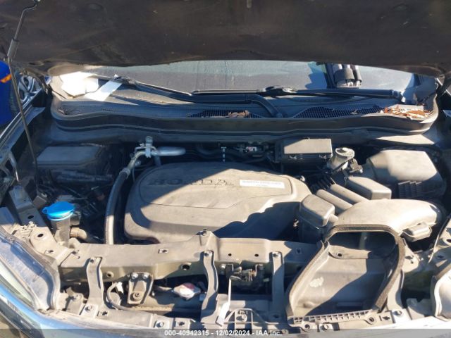 5FNYF6H04HB100236 Honda Pilot Elite