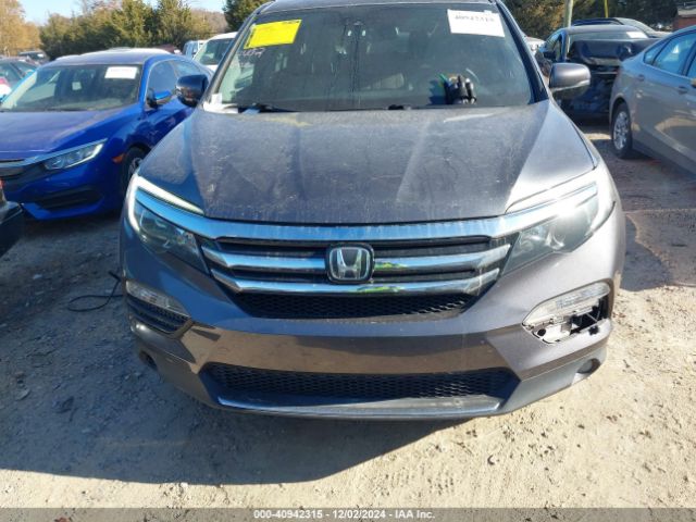 5FNYF6H04HB100236 Honda Pilot Elite