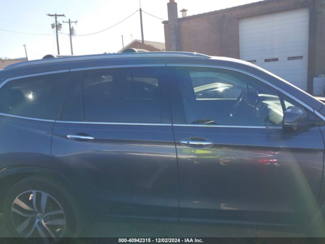 5FNYF6H04HB100236 Honda Pilot Elite