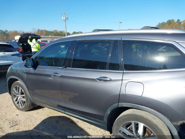 5FNYF6H04HB100236 Honda Pilot Elite