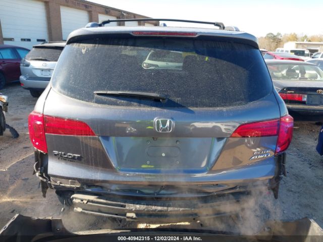 5FNYF6H04HB100236 Honda Pilot Elite