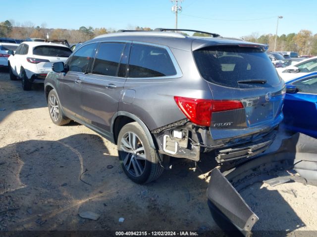5FNYF6H04HB100236 Honda Pilot Elite