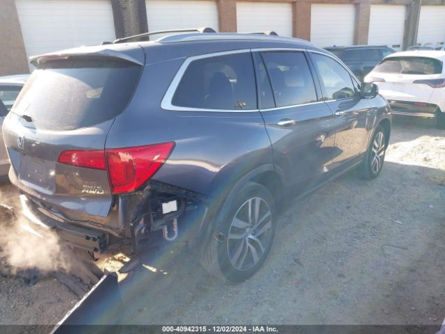 5FNYF6H04HB100236 Honda Pilot Elite