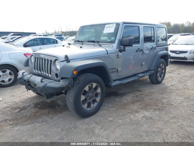 1C4BJWDG0GL214379 Jeep Wrangler Unlimited Sport