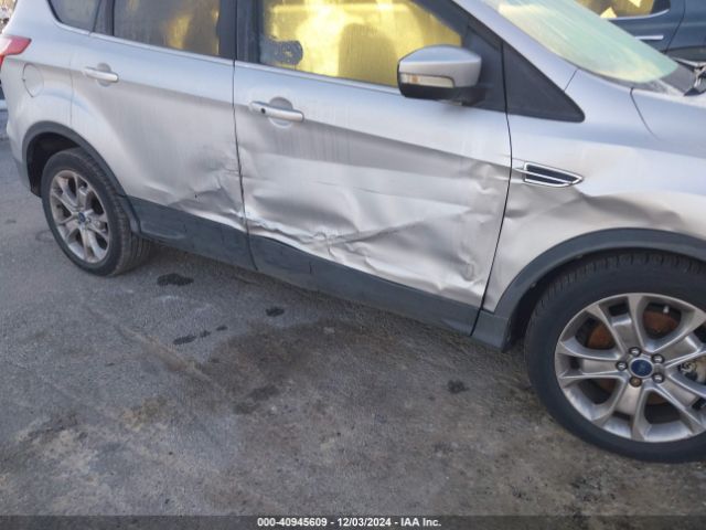 1FMCU0J99EUA79243 Ford Escape Titanium