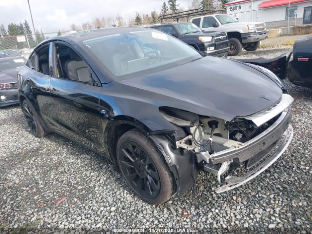 2024 TESLA MODEL Y 7SAYGAEE7RF118962 Photo 0