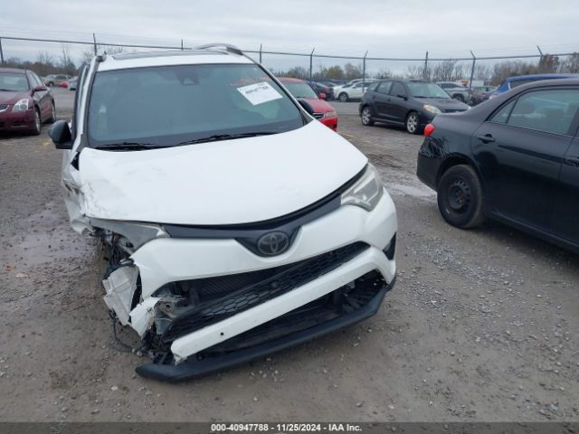 JTMNFREV4GJ084552 Toyota RAV4 SE