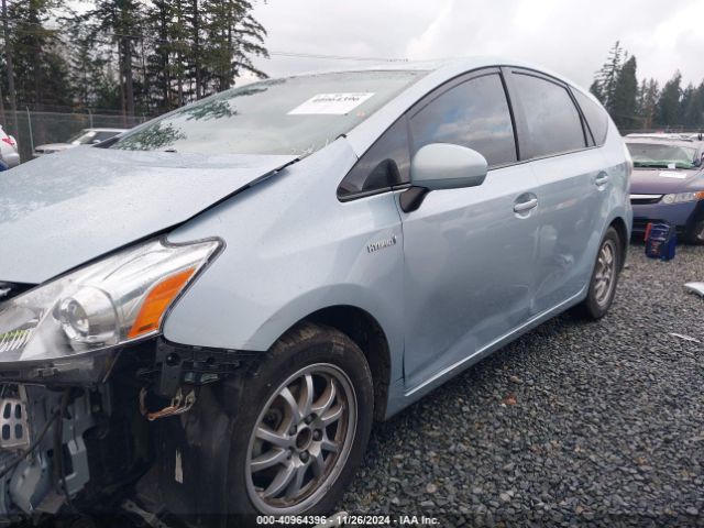 JTDZN3EU6EJ002861 Toyota Prius V Three