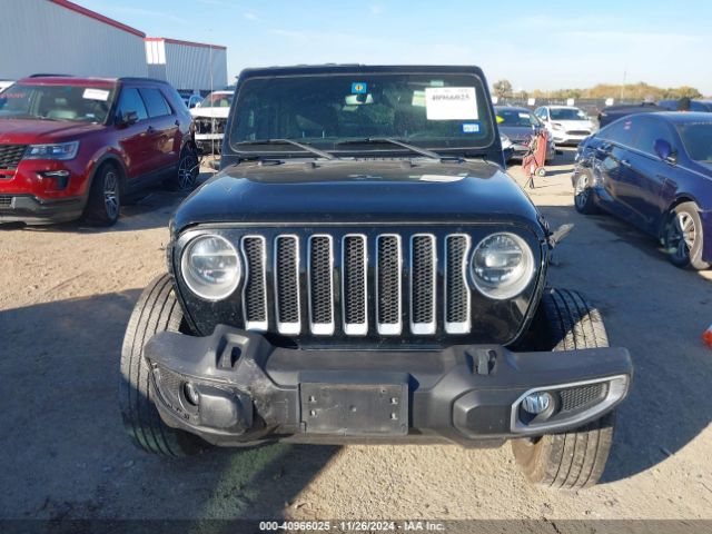 1C4HJXEG9JW121039 Jeep Wrangler Unlimited Sahara 4x4