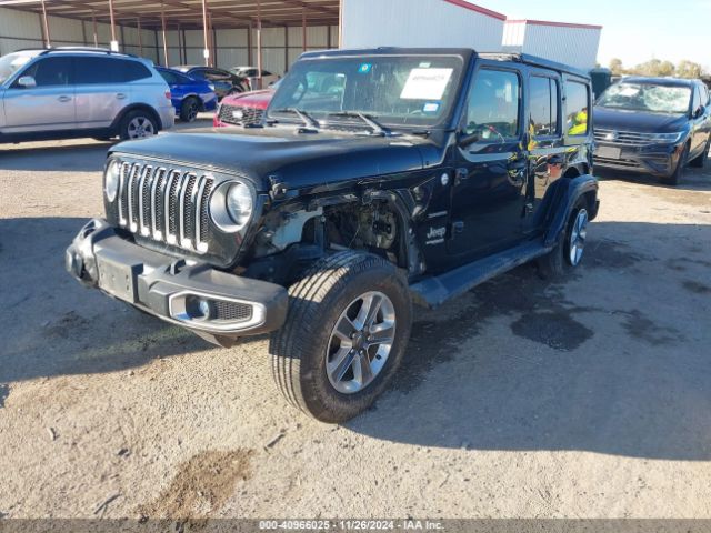 1C4HJXEG9JW121039 Jeep Wrangler Unlimited Sahara 4x4