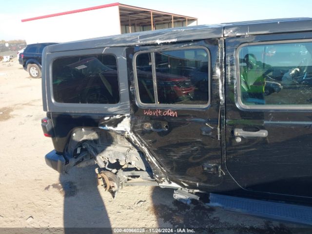 1C4HJXEG9JW121039 Jeep Wrangler Unlimited Sahara 4x4