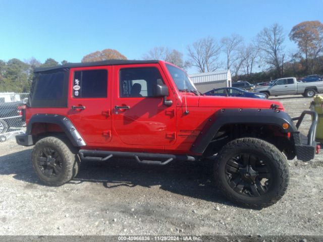 1C4BJWDG3EL318961 Jeep Wrangler Unlimited Sport