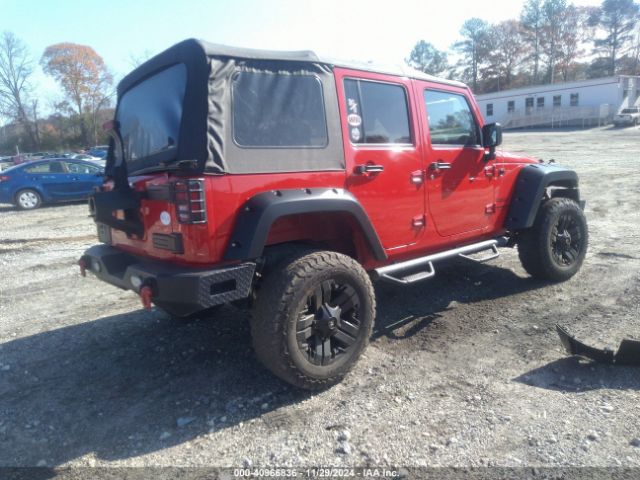 1C4BJWDG3EL318961 Jeep Wrangler Unlimited Sport