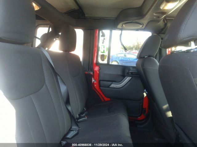 1C4BJWDG3EL318961 Jeep Wrangler Unlimited Sport