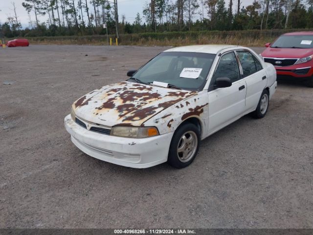 1999 MITSUBISHI MIRAGE JA3AY26A9XU014571 Photo 1