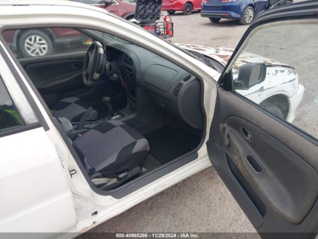 1999 MITSUBISHI MIRAGE JA3AY26A9XU014571 Photo 4