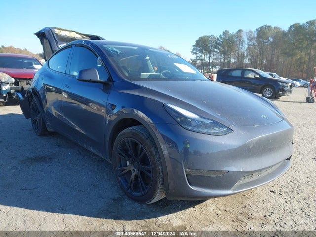 2023 TESLA MODEL Y 7SAYGDEE0PA169585 Photo 0