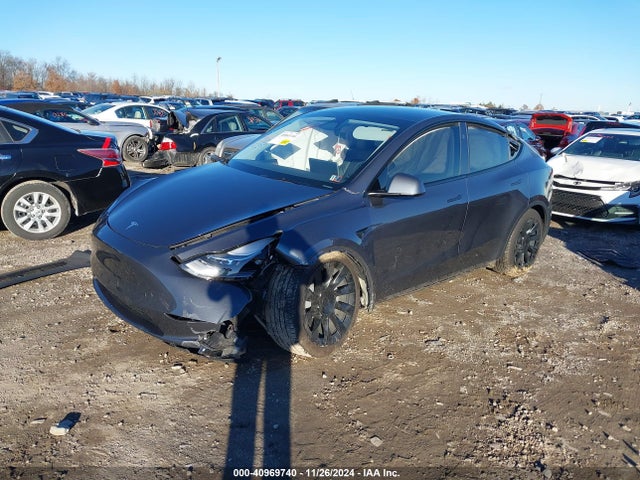 2023 TESLA MODEL Y 7SAYGDEE9PA208674 Photo 1