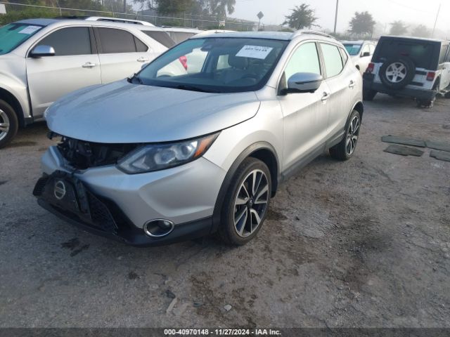 JN1BJ1CP3JW500563 Nissan Rogue Sport Sl