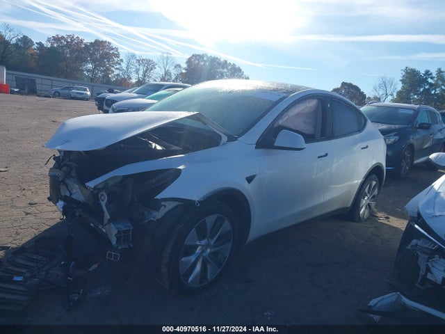 2023 TESLA MODEL Y 7SAYGDEE3PA130666 Photo 1