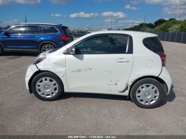 JTNJJXB00EJ030457 Scion IQ