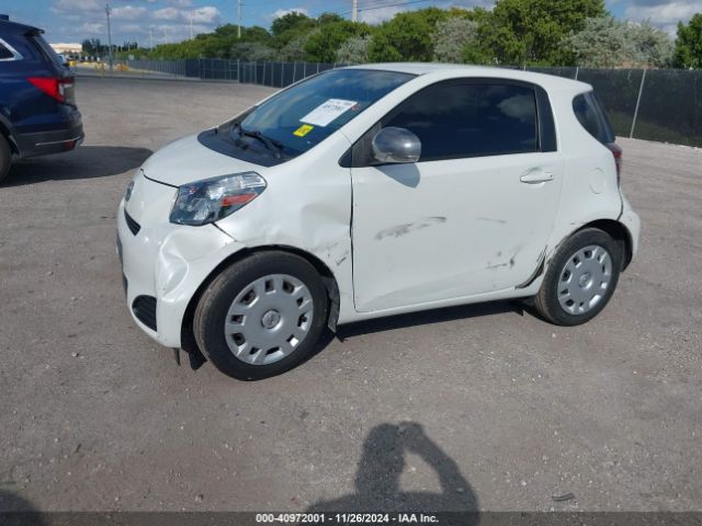 JTNJJXB00EJ030457 Scion IQ