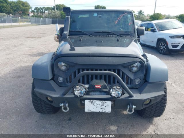 1C4BJWDG5GL146693 Jeep Wrangler Unlimited Sport
