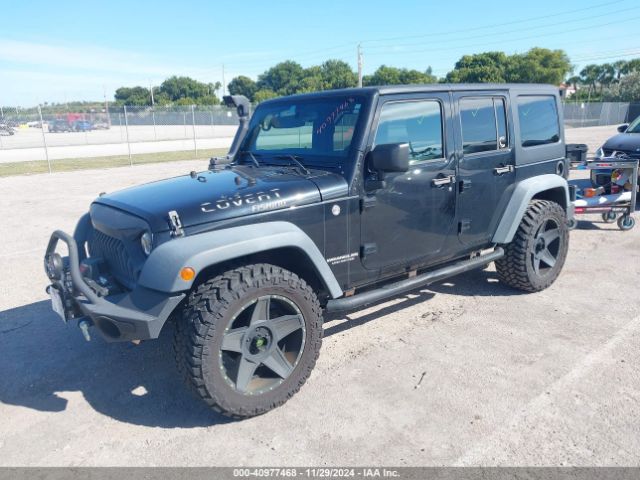1C4BJWDG5GL146693 Jeep Wrangler Unlimited Sport
