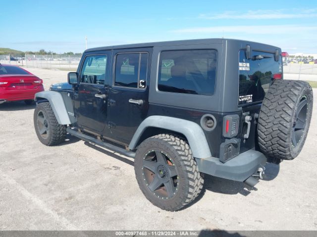 1C4BJWDG5GL146693 Jeep Wrangler Unlimited Sport