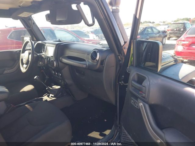 1C4BJWDG5GL146693 Jeep Wrangler Unlimited Sport