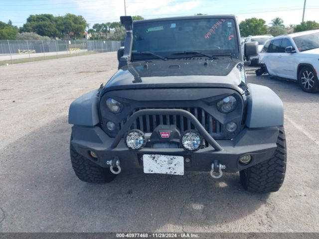 1C4BJWDG5GL146693 Jeep Wrangler Unlimited Sport