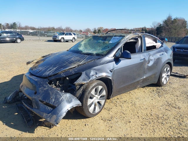 2021 TESLA MODEL Y 5YJYGAEE4MF131030 Photo 1