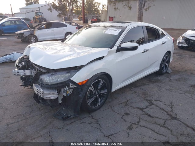 Honda Civic Touring 2016 2HGFC1F97GH640811 Image 2