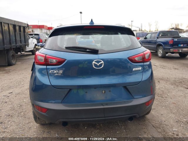JM1DKFC79J0318367 Mazda Cx-3 Touring