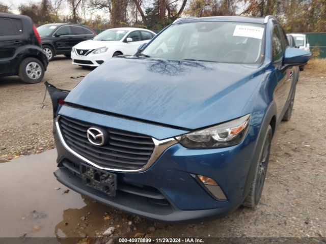 JM1DKFC79J0318367 Mazda Cx-3 Touring