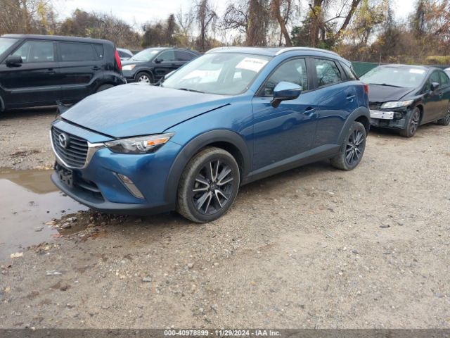 JM1DKFC79J0318367 Mazda Cx-3 Touring