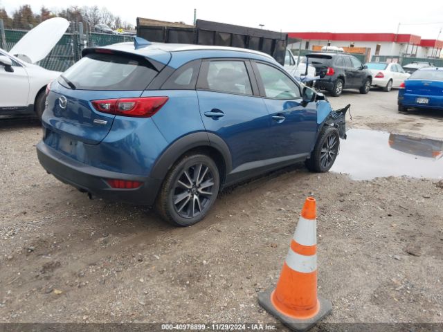 JM1DKFC79J0318367 Mazda Cx-3 Touring