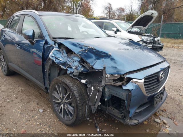 JM1DKFC79J0318367 Mazda Cx-3 Touring