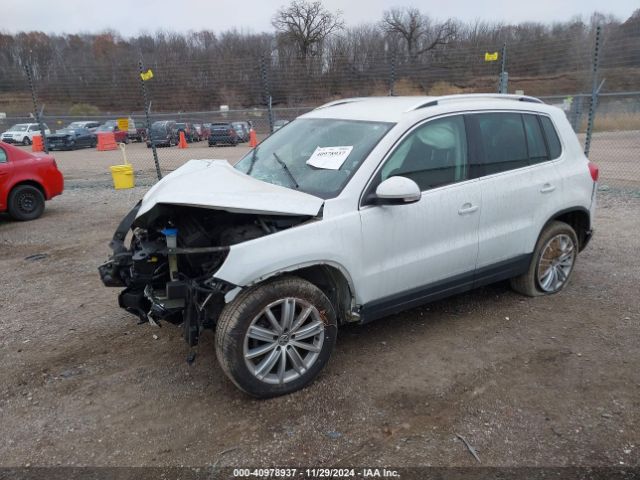WVGBV3AX5EW619524 Volkswagen TIGUAN SE