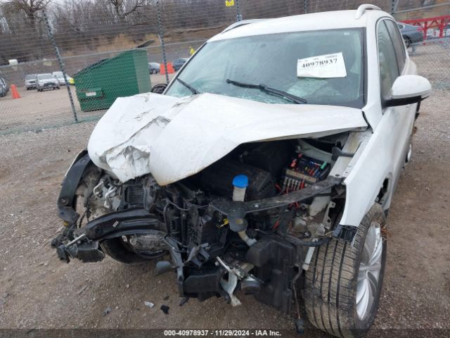 WVGBV3AX5EW619524 Volkswagen TIGUAN SE