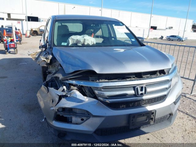5FNYF5H16GB040557 Honda PILOT LX