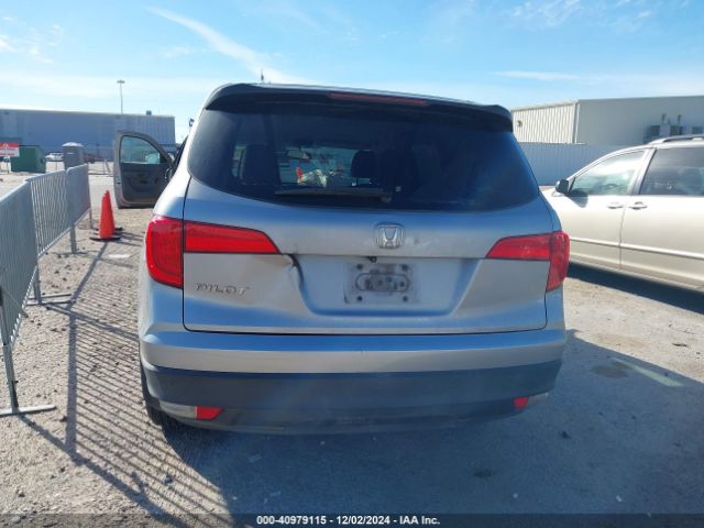 5FNYF5H16GB040557 Honda PILOT LX