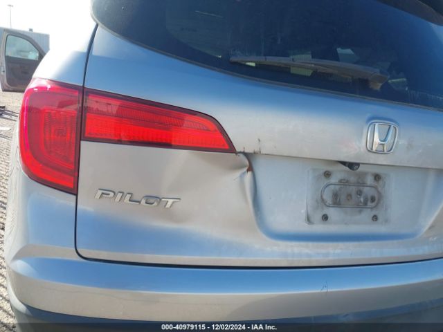 5FNYF5H16GB040557 Honda PILOT LX