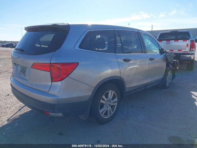 5FNYF5H16GB040557 Honda PILOT LX