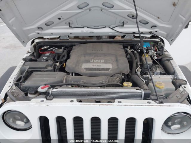 1C4AJWAG9GL297973 Jeep Wrangler Sport