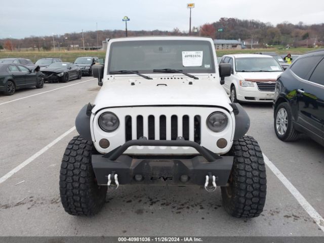 1C4AJWAG9GL297973 Jeep Wrangler Sport