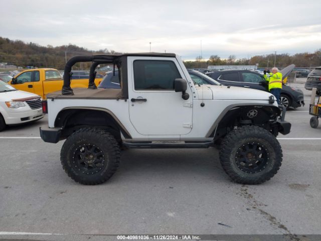 1C4AJWAG9GL297973 Jeep Wrangler Sport