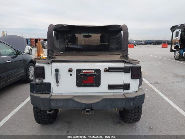1C4AJWAG9GL297973 Jeep Wrangler Sport
